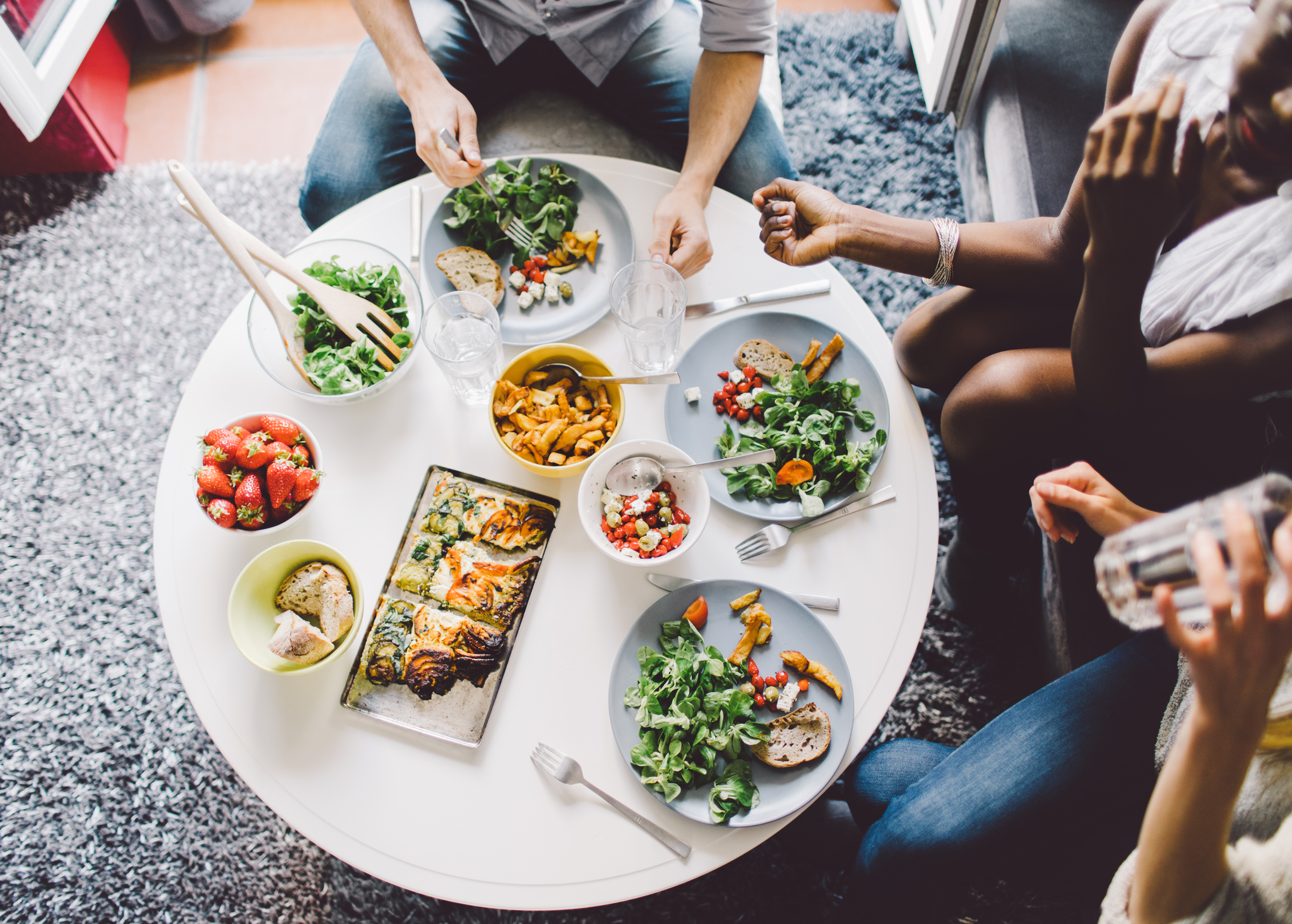 Friends enjoying lunch at home