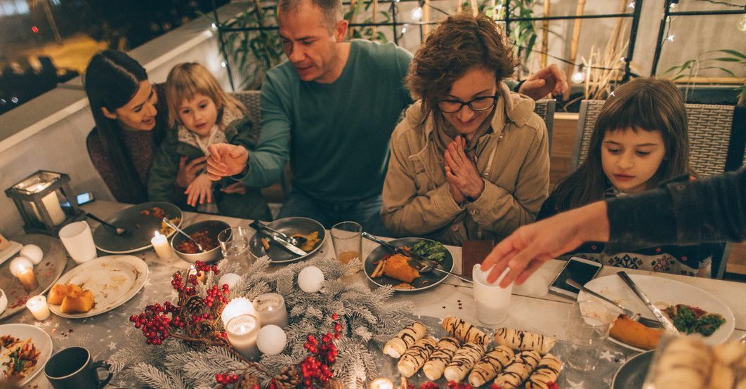 Photo of a multi-generation family having holiday dinner